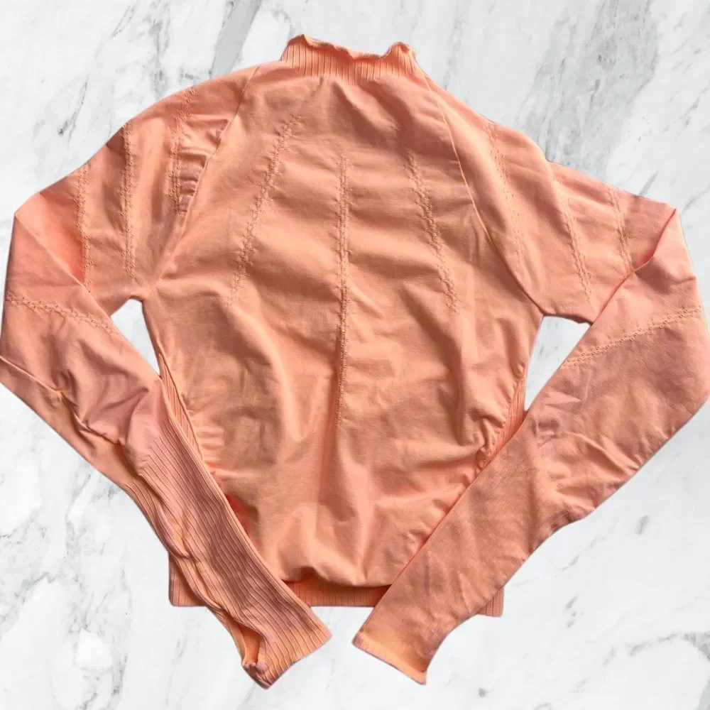 8. New! Free People Movement Good Karma Hi-Neck Layer Long Sleeve Top in Peach - Picture 7 of 12